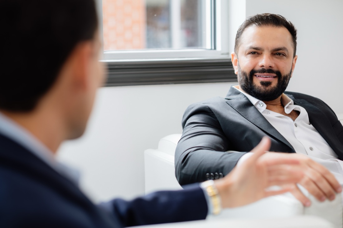 Dr. Kassis in conversation during a consultation